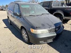 Used Left Headlight Assembly fits 2004 Honda Odyssey L. Grade B